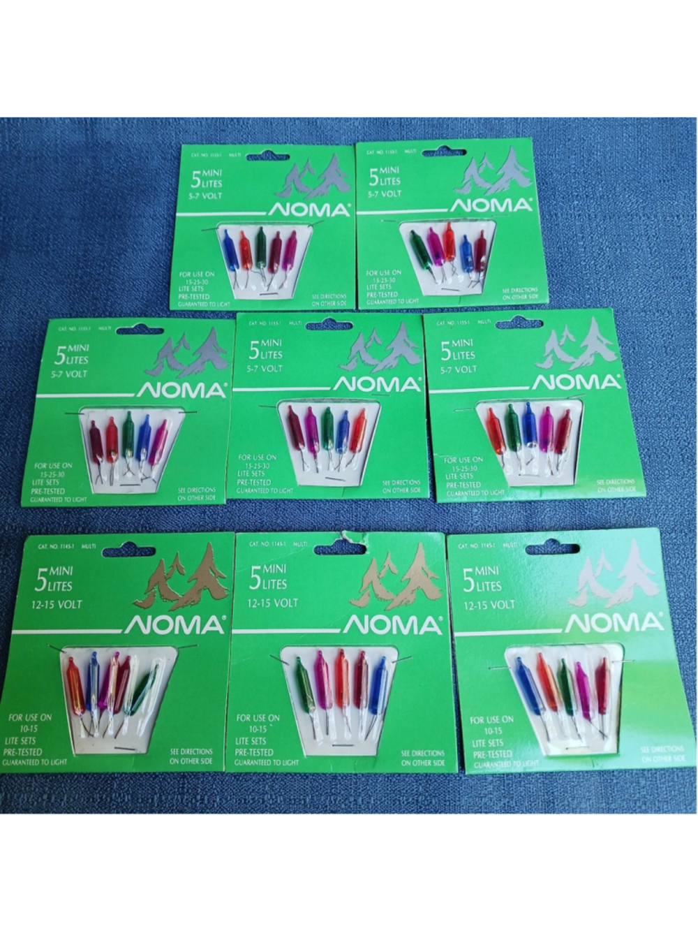 VTG NOS Noma Mini Lights Replacement Lot Of 8 Packages Multi Color Varied Volt